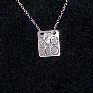 Miriam Merenfeld  XOXO tag necklace in sterling silver marked  925